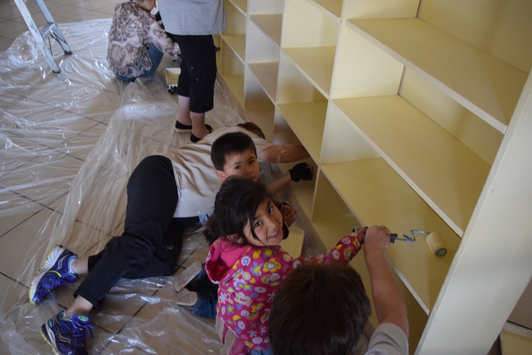 The bookshelves in the eating area were repainted (with the children’s help).